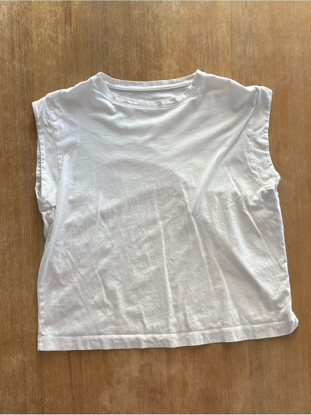 A new day sleeveless tee in white size 10
100% cotton